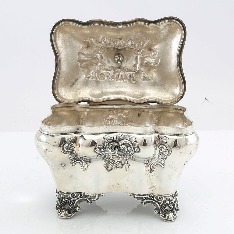 Christian Hammer sugar box with key, silver, Stockholm 1858, Neo-Rococo.