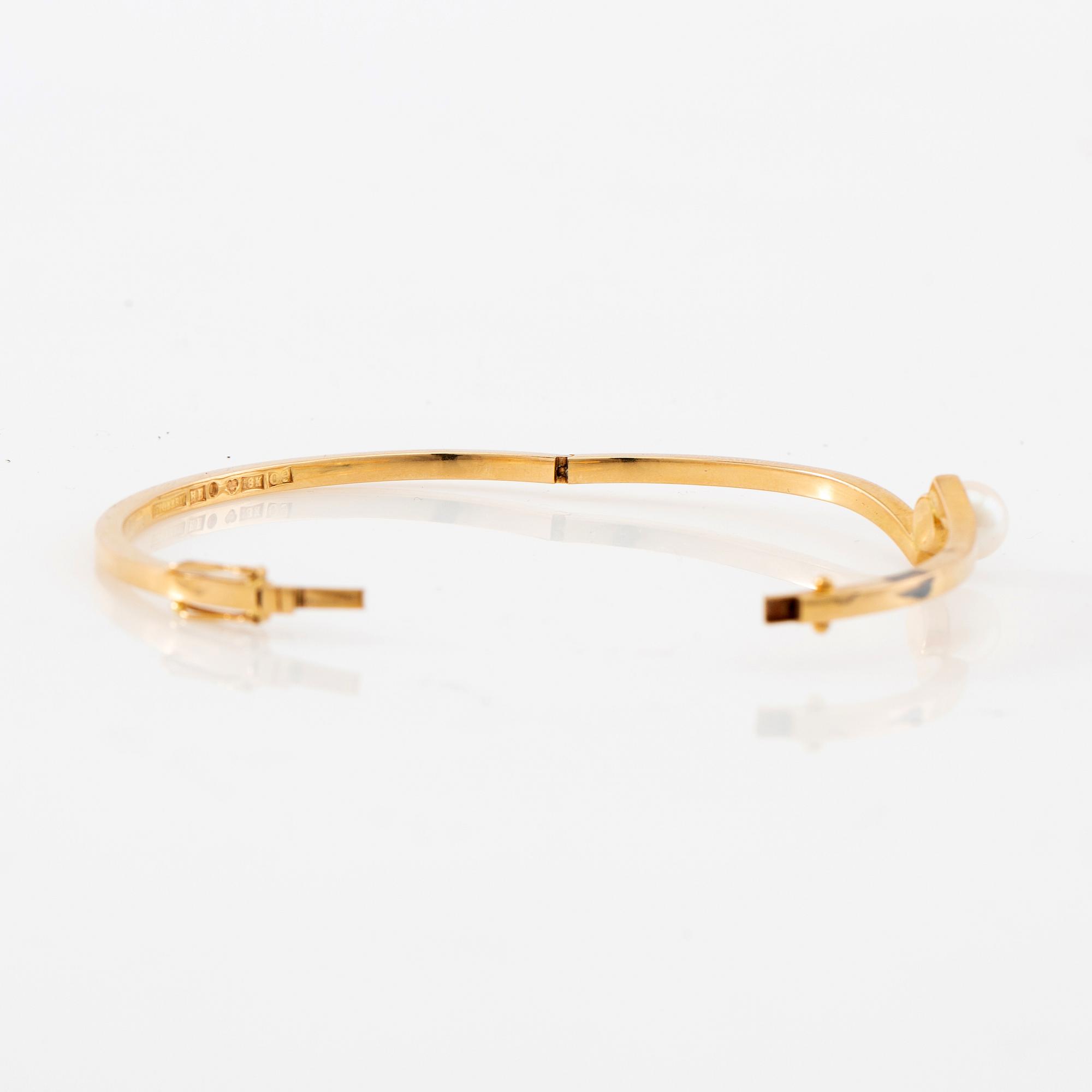 Armring, 18K guld och pärla, Stigbert, Stockholm, 1964.