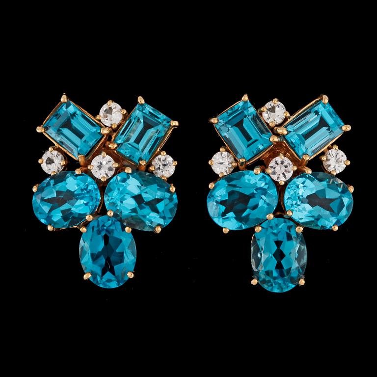 A pair of blue topasz and white sapphire earrings.