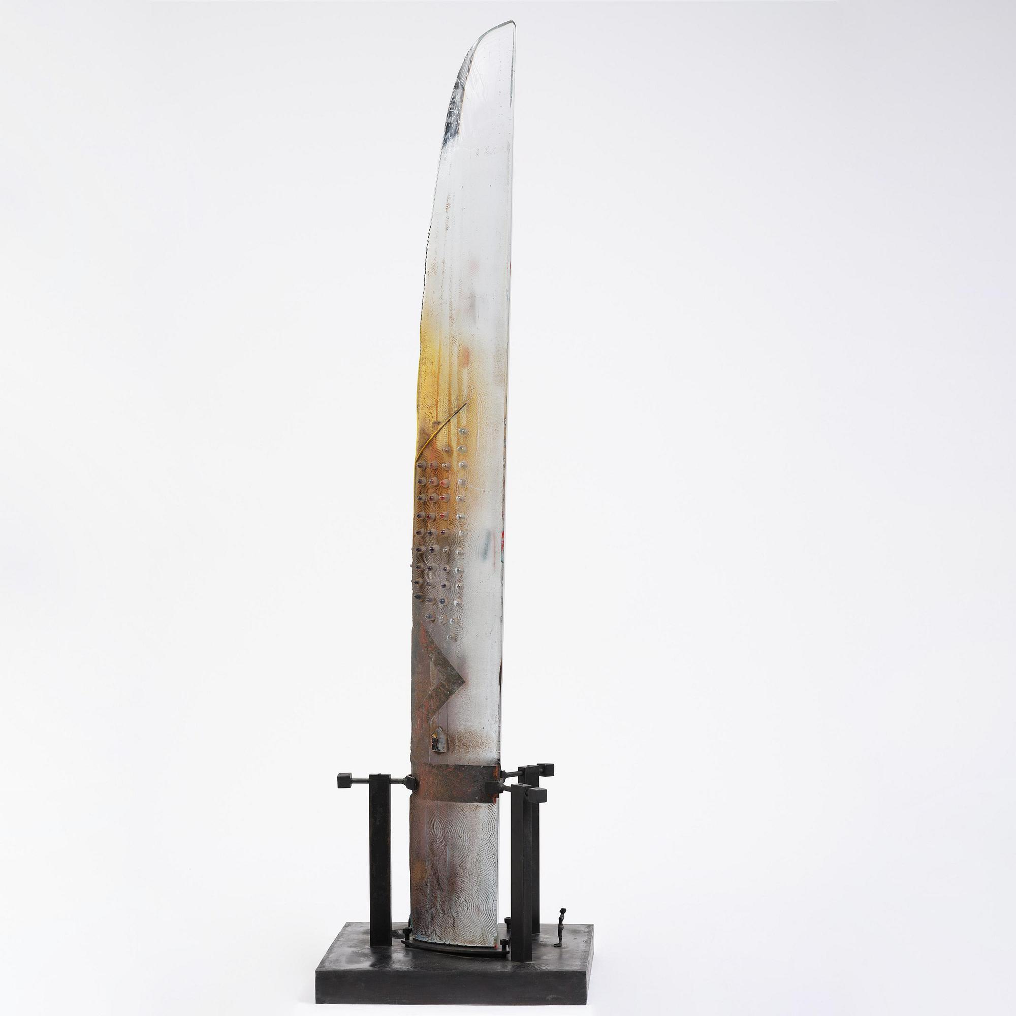 Bertil Vallien, a sand cast glass sculpture of a standing half-boat, Kosta Boda, Sweden.