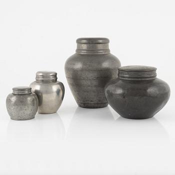 A set of four Japanese pewter tea caddies with covers and liners, circa 1900.