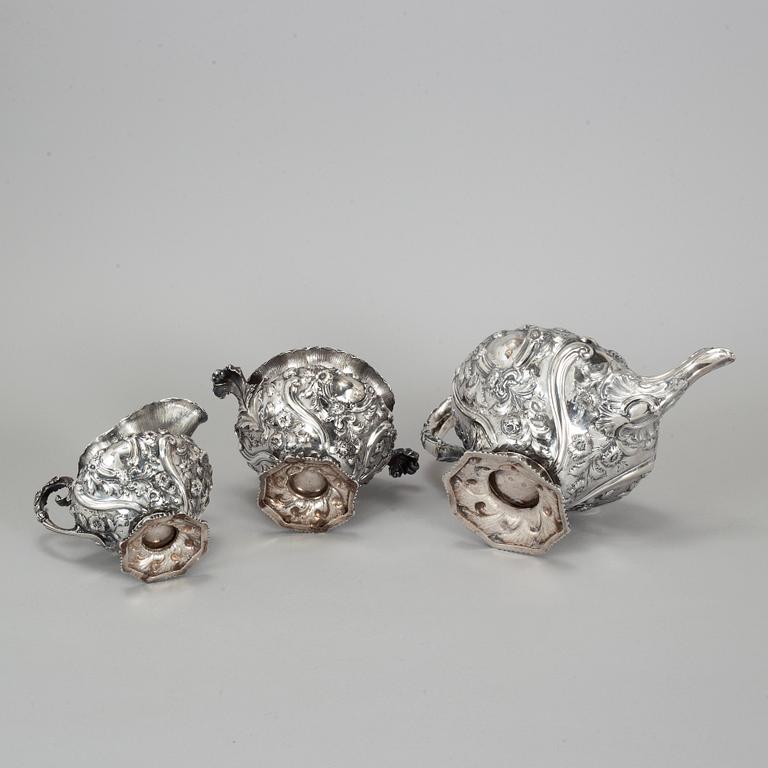 A silver tea pot, sugar bowl and creamer, Charles Fox II, London 1832.