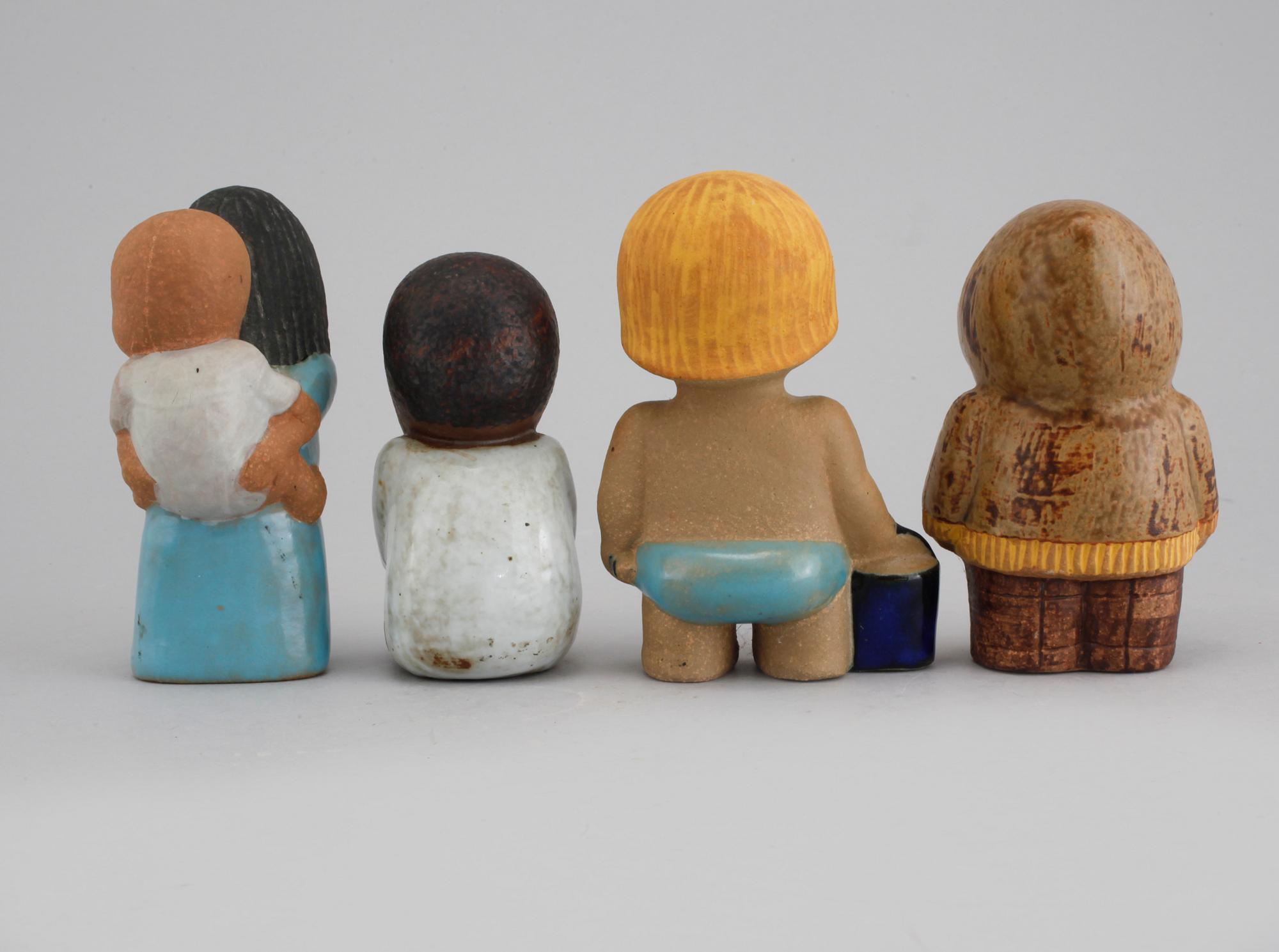 Four figurines designed by Lisa Larson for Gustavsberg.