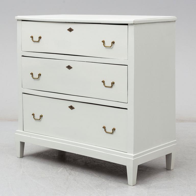 A 19th cnetury chest of drawers.