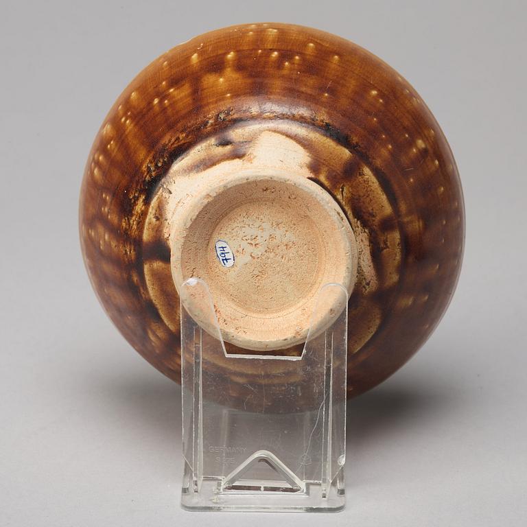 A group of three brown glazed bowls, China, 20th Century.