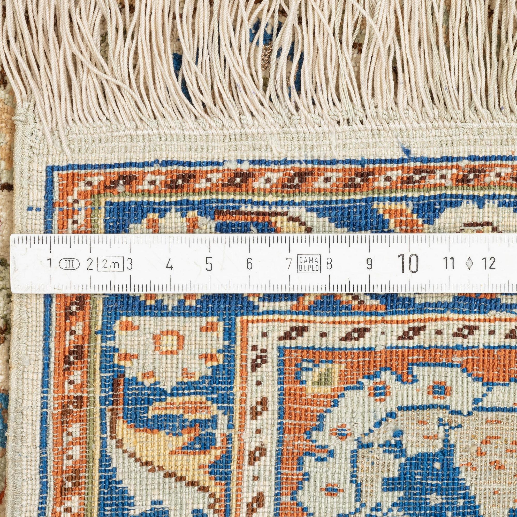 A semi-antique silk and metall Kayseri rug, c. 147 x 96 cm.