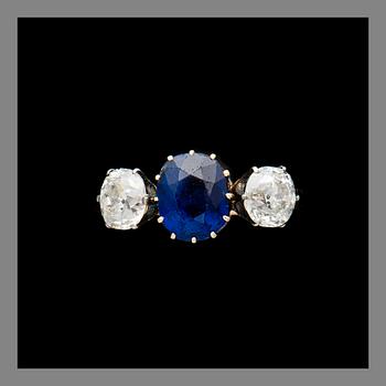 A RING, 14K (56) gold, sapphire, old cut diamonds. Assay mark Ivan Lebedkin, Moscow. Weight c. 2.4 g.