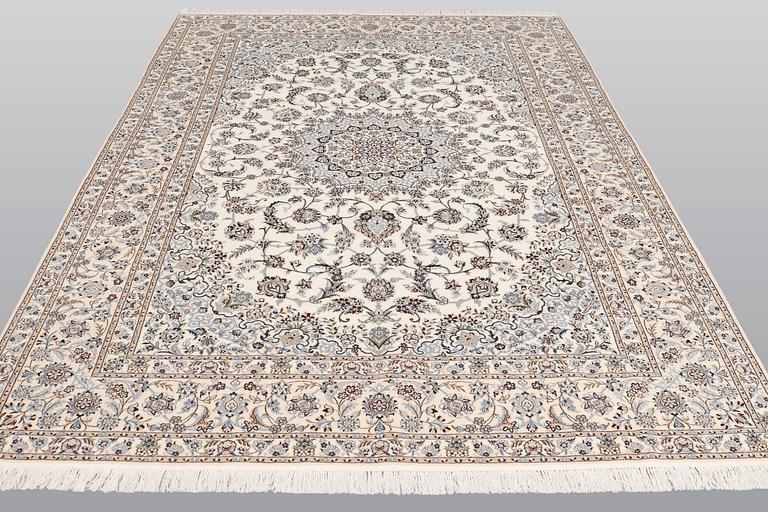A carpet, Nain part silk s.k 6LAA, ca 310 X 209 cm.