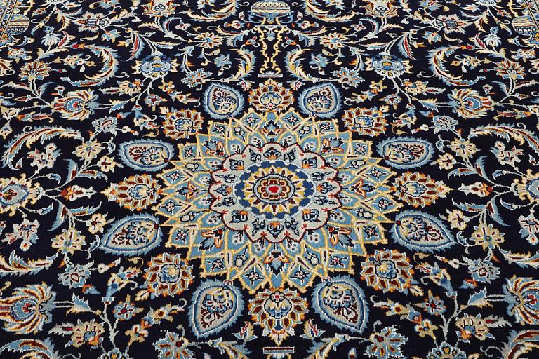 A carpet, Kashan, c. 382 x 275 cm.