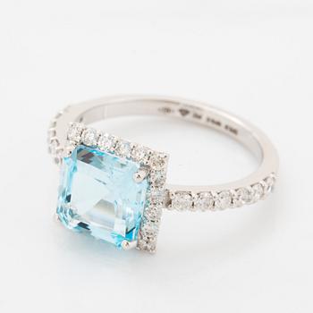 Blue topaz and brilliant-cut diamond ring.