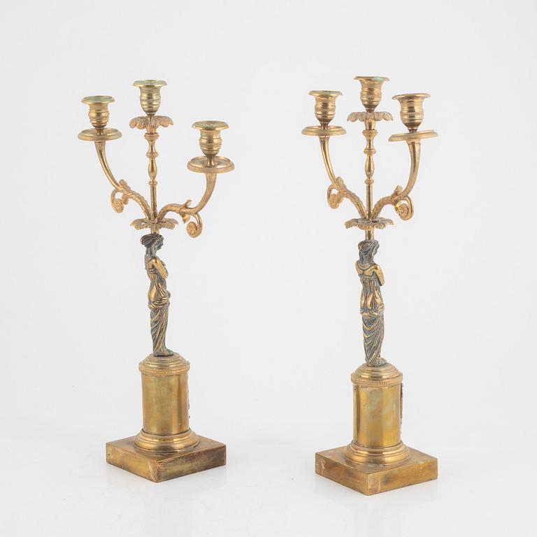 A pair of Empire style candelabra, around 1900.