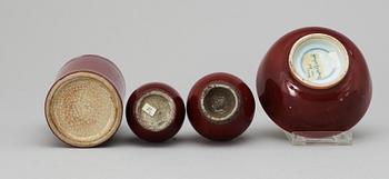 A set of one sang de boef-glazed bowl, a brush pot and two vases, Qing dynasty.