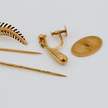 PARTI GULD, 8 delar, 18K guld, total vikt ca 17,1g.