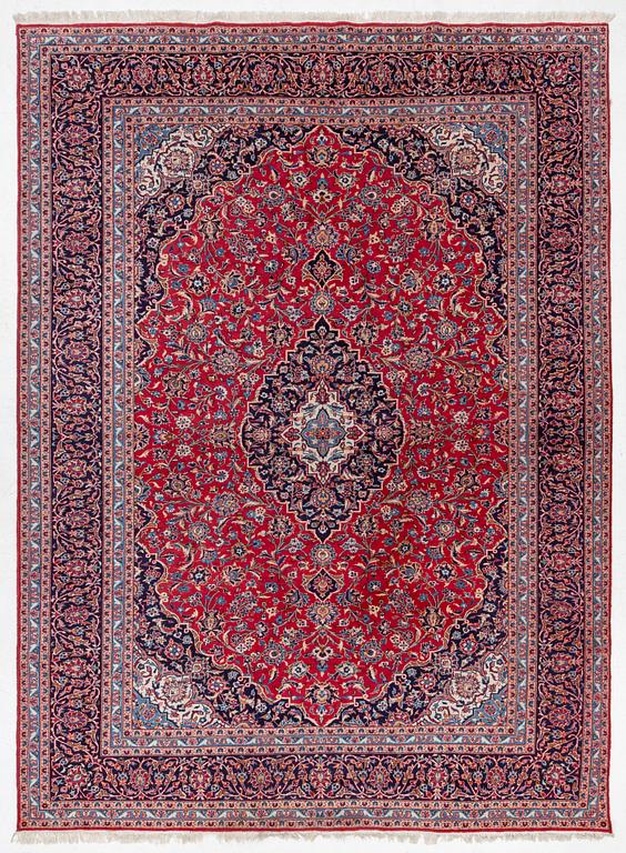 An Old Keshan carpet, approx. 400 x 299 cm.