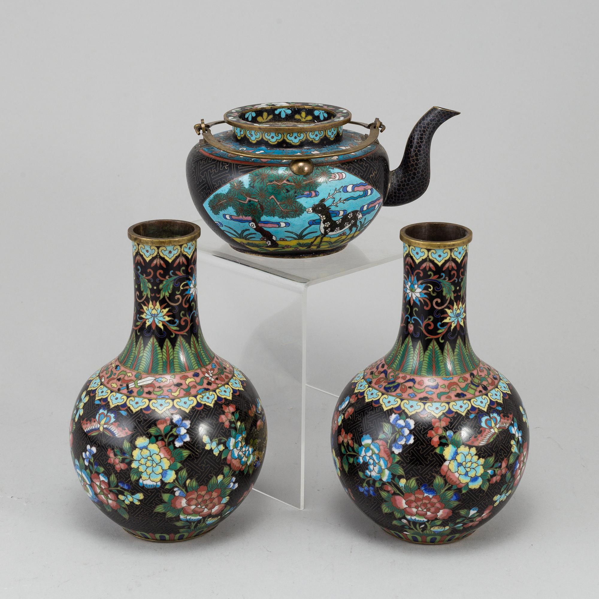 A group of three Chinese 
cloisonne vases and teapot with cover, 20th century.