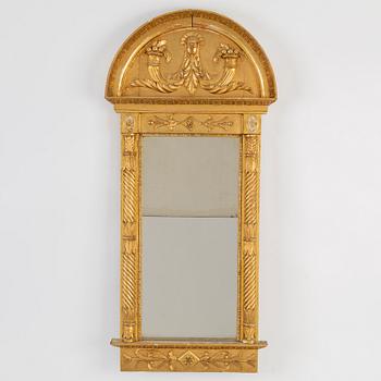 Jonas Frisk, a gilt wood Empire mirror, first half of the 19th Century.