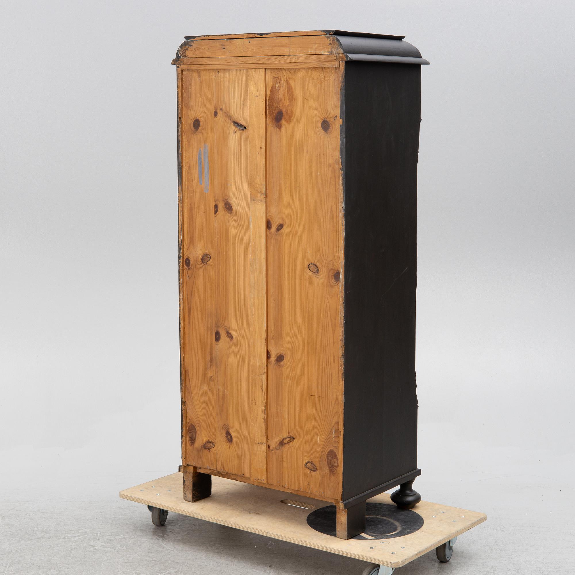 A cabinet, circa 1900.