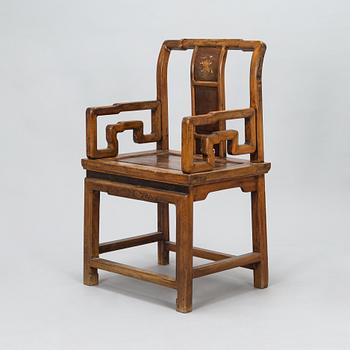 A Chinese hardwood armchair, circa 1900.