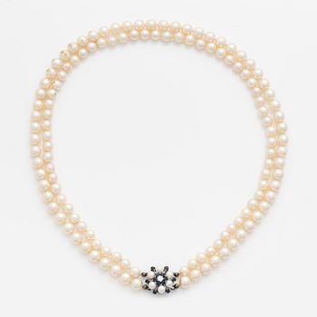 A two strand cultured pearl necklace.