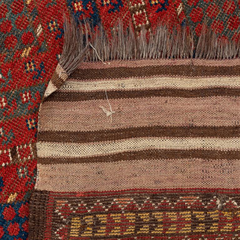 An antique Beshir carpet, ca 495 x 206 cm, around the year 1875.