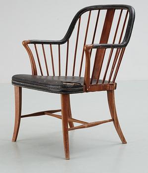 A mahogany and black leather armchair attributed to Josef Frank, either Haus & Garten, Austria or Svenskt Tenn,