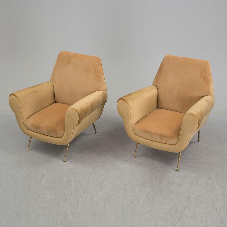 A pair of  mid-20th century lounge chairs by Gigi Radice, Minotti.