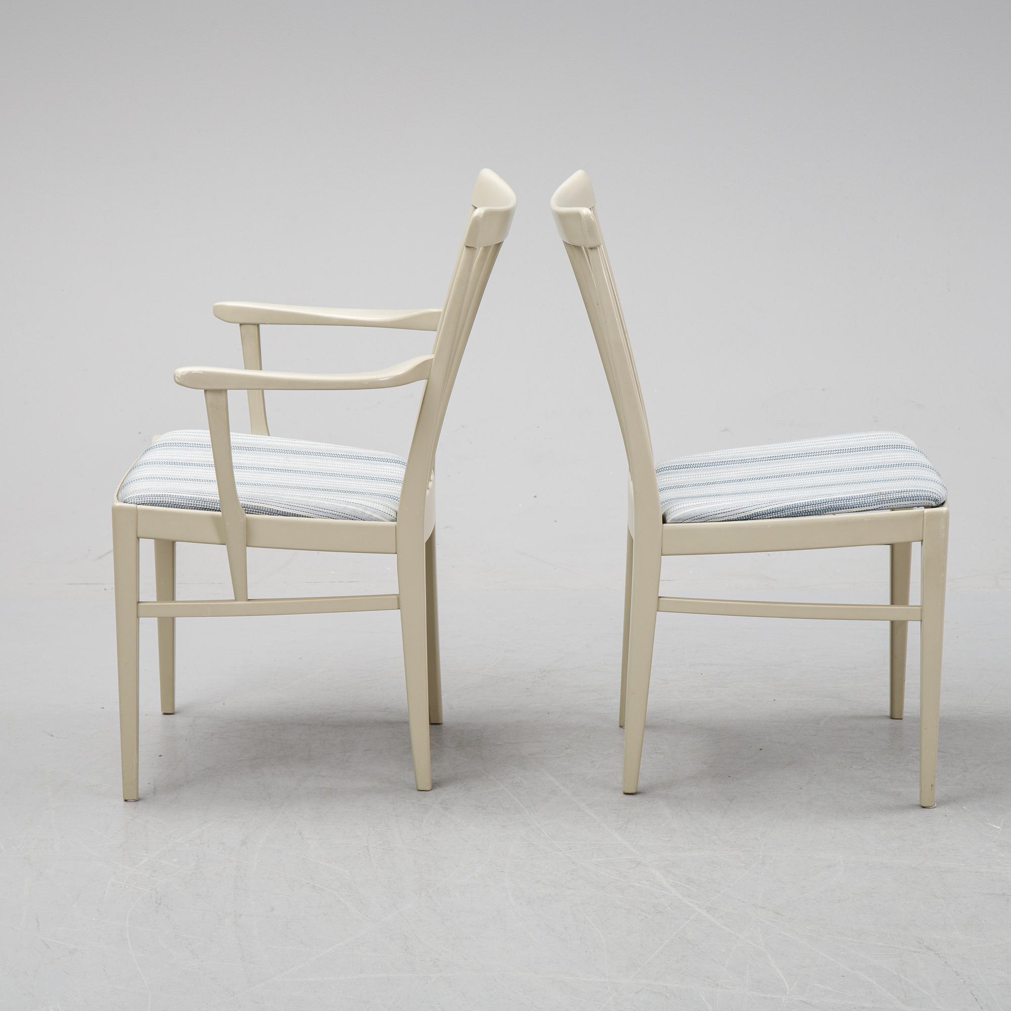 A dining table with two armchairs and six chairs by Carl Malmsten for Bodafors.