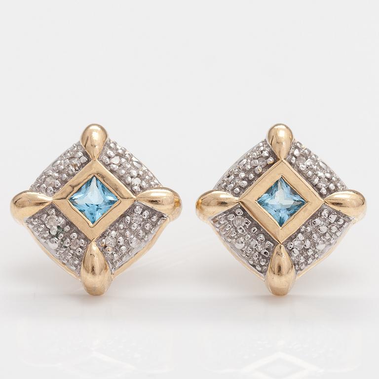 A set of 14K gold earrings and pendant with topazes and diamonds ca. 0.04 ct.