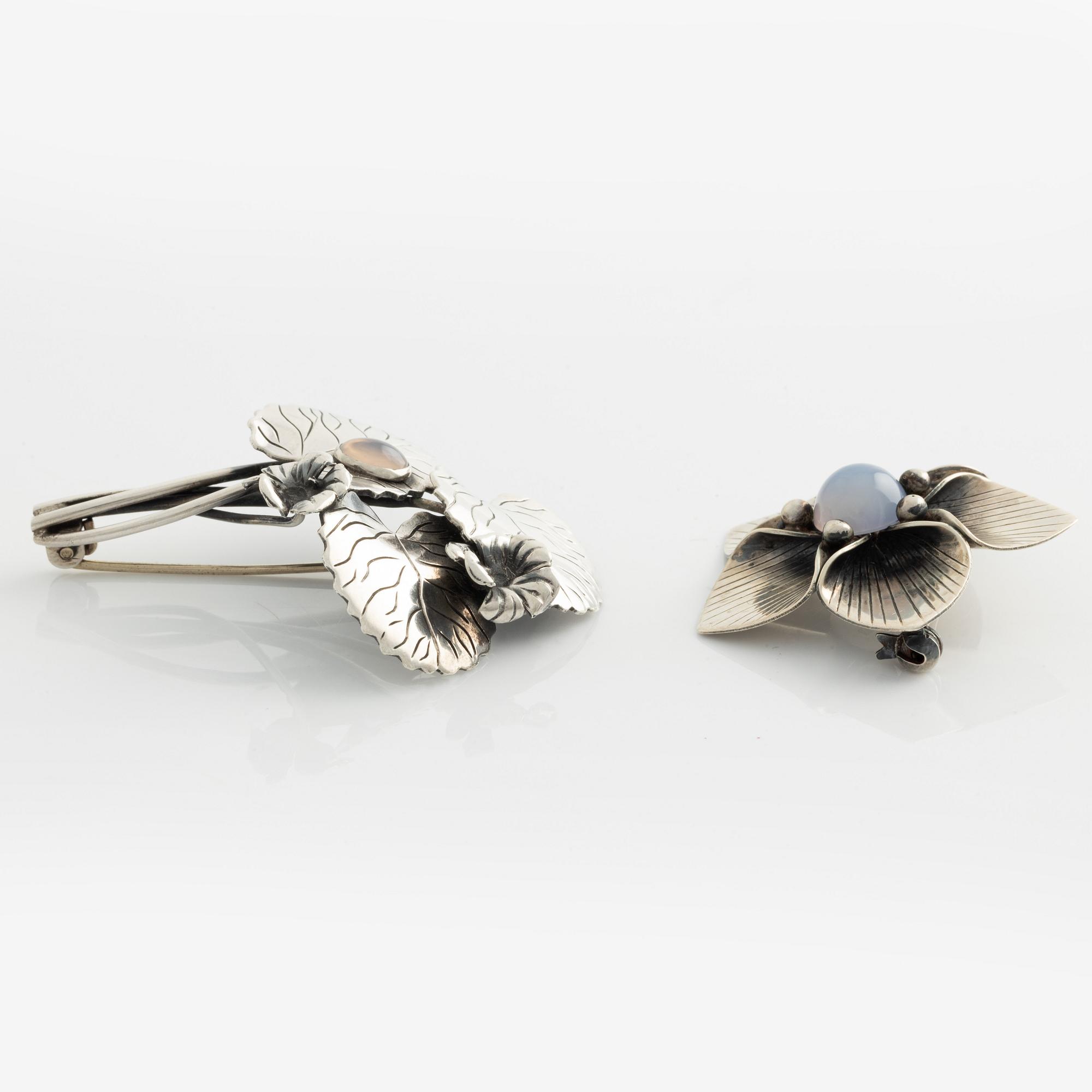 Arvo Saarela, two silver brooches.