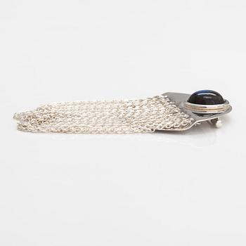 Elis Kauppi, A sterling silver brooch with a spectrolite. Kupittaan Kulta, Turku. Prototype.