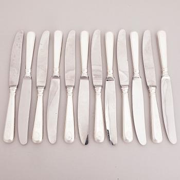 A 111-piece set of shell decorated silver cutlery, Finland, mainly from the first half of the 20th Century.