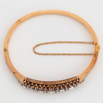 Armring 18K guld och silver med rosenslipade diamanter.