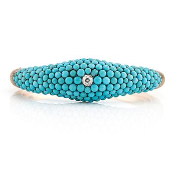 508. An 18K gold bracelet with turquoises and an old-cut diamond.
