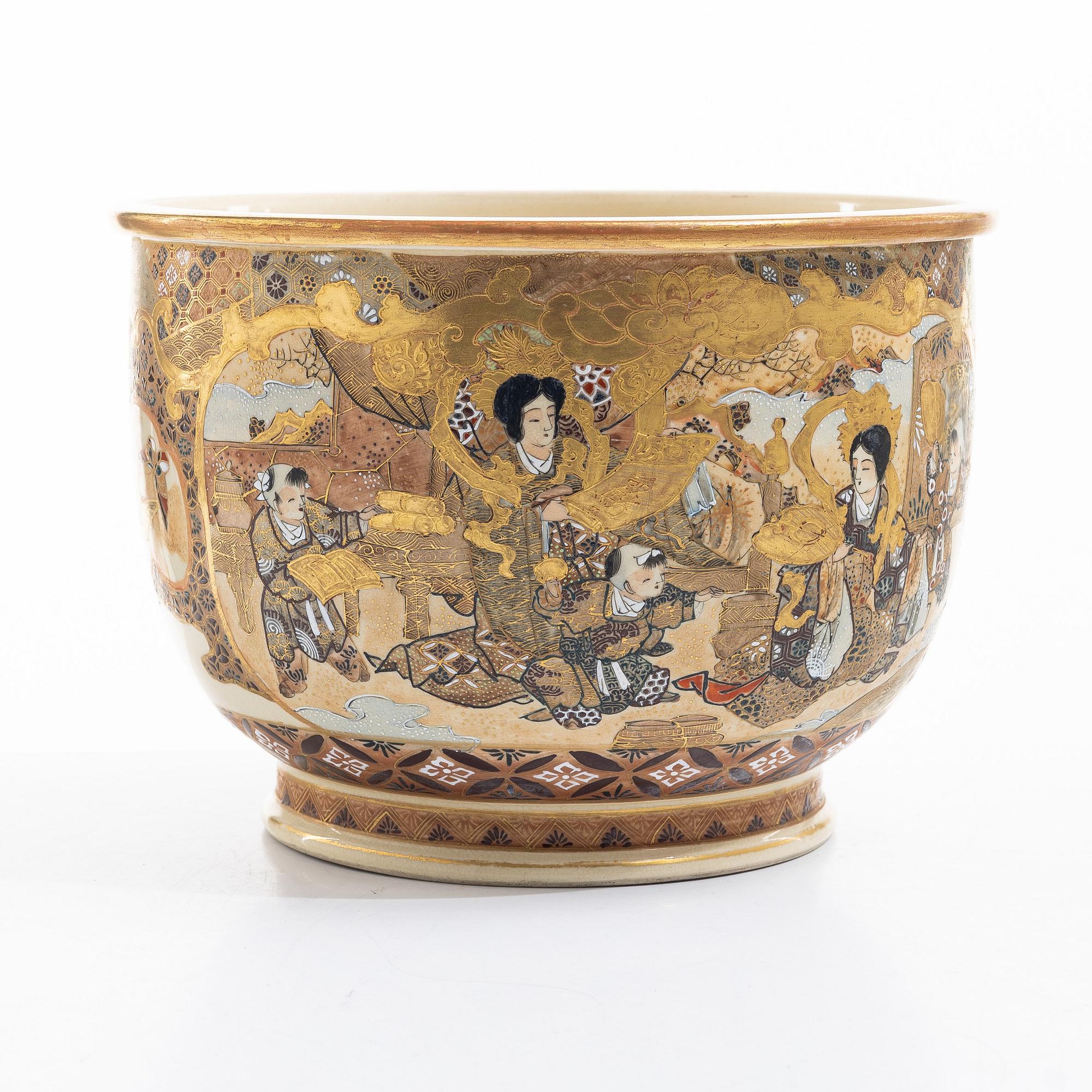 A Japanese satsuma figural flower pot, early 20th century.