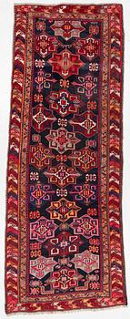 A semi-antique Anatolian runner, c. 409 x 159 cm.