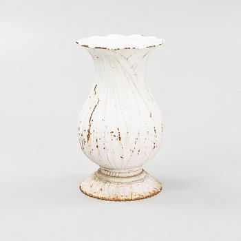 A 20th Century cast iron garden urn.
