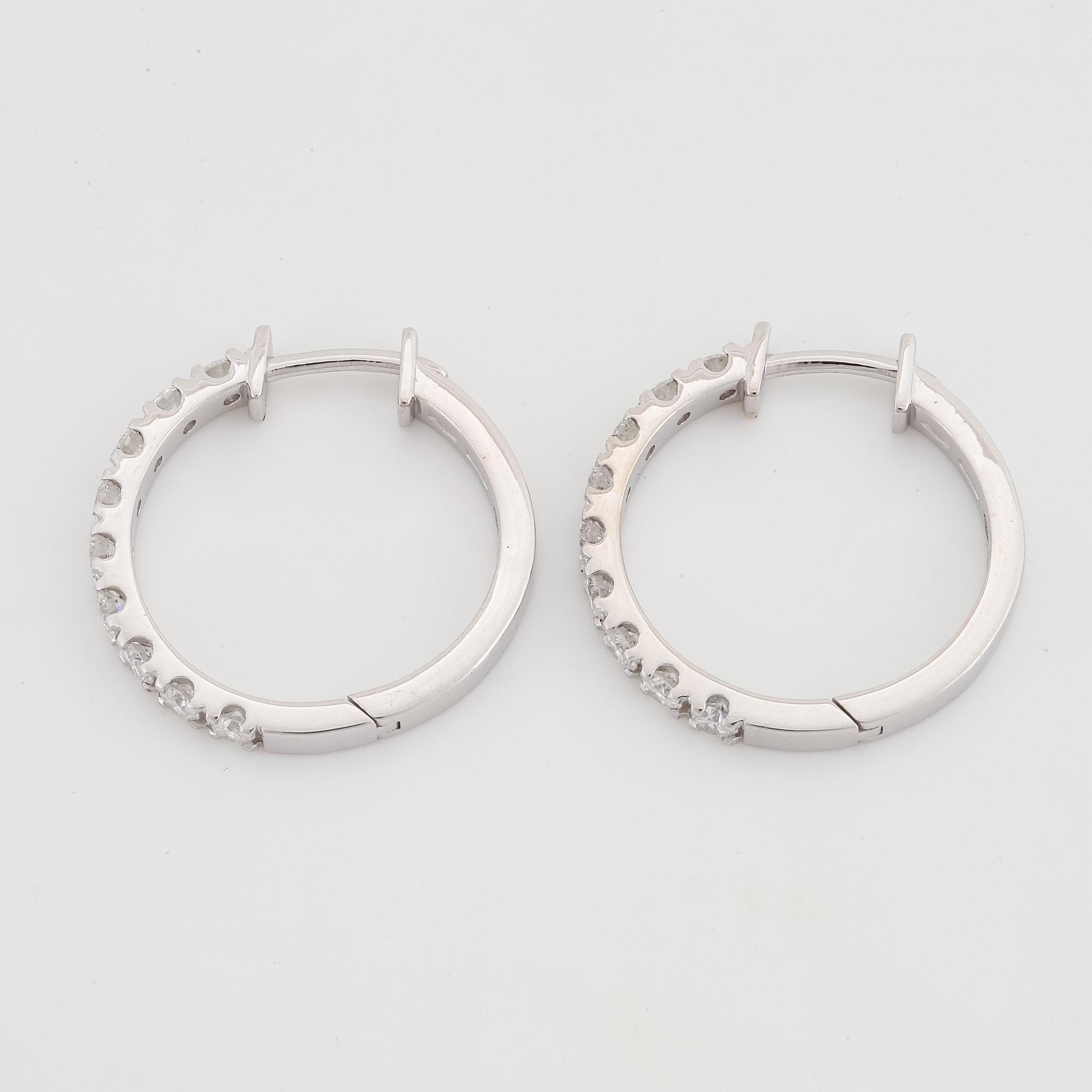 Brilliant-cut diamond earrings, total 0,76 ct.
