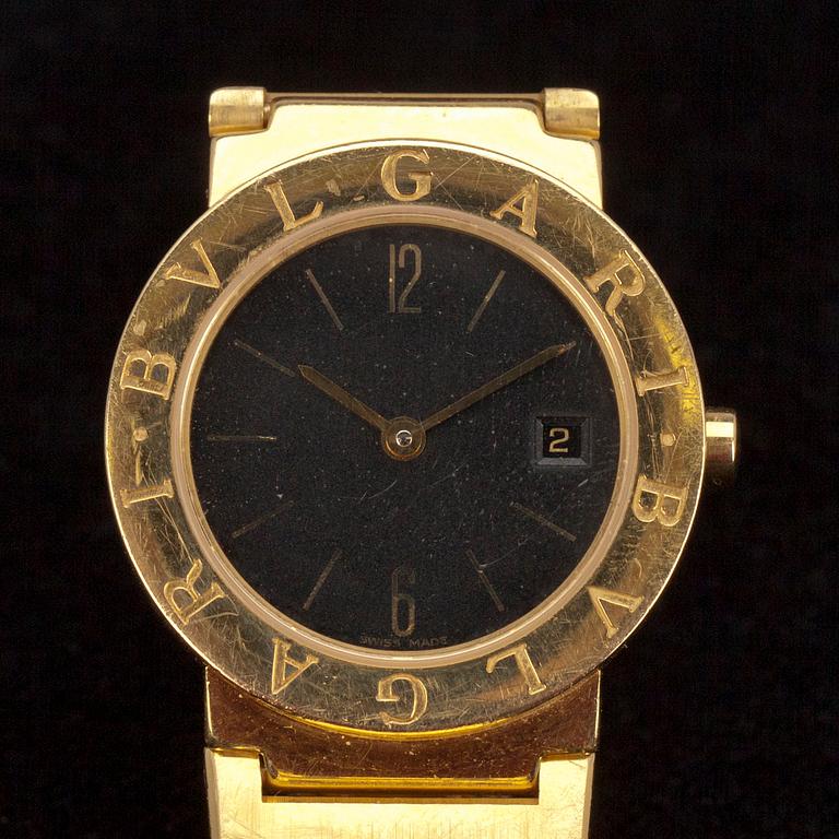 DAMARMBANDSUR, Bulgari. 18K guld, BB 26 GGD. Kvartsverk med datum. Vikt 88 g.