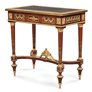 62. A Louis XVI-style late 19th century table.