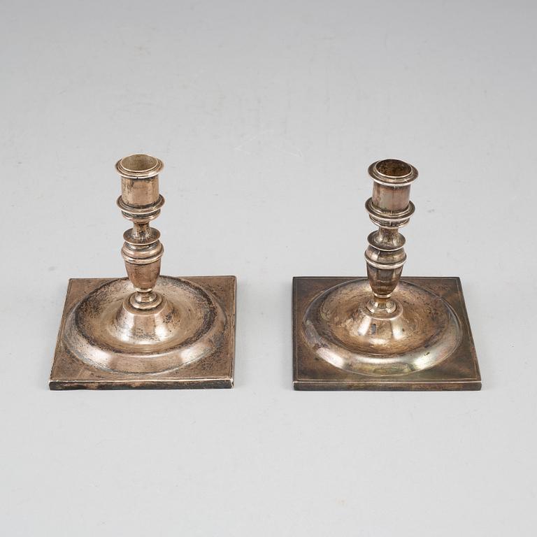 A pair of 19th century silver candlesticks.