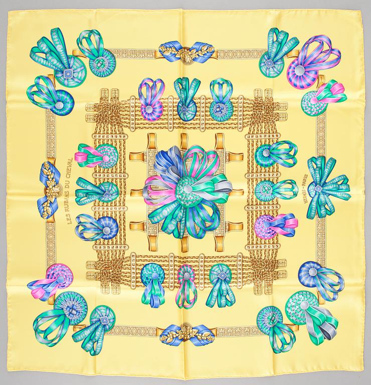 A silk scarf "Les rubans du cheval" by Hermès.