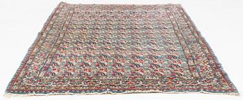 A Persian rug, c. 220 x 140 cm.