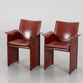 A PAIR OF "KORIUM" CHAIRS BY TITO AGNOLI, MATTEO GRASSI.