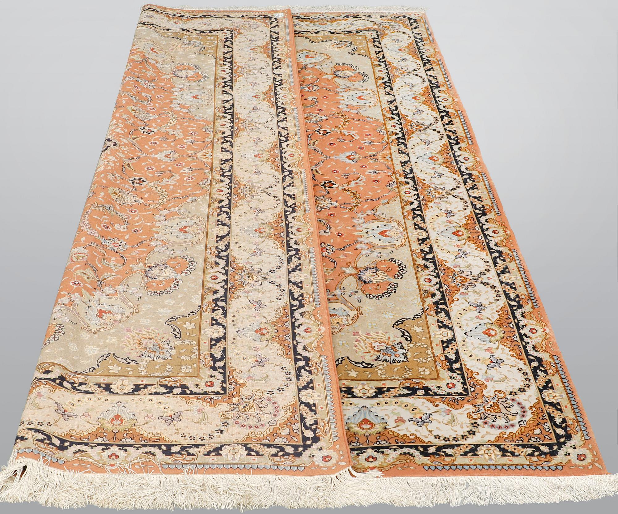 A part silk Tabriz carpet, so called 50 Raj, c 301 x 200 cm.