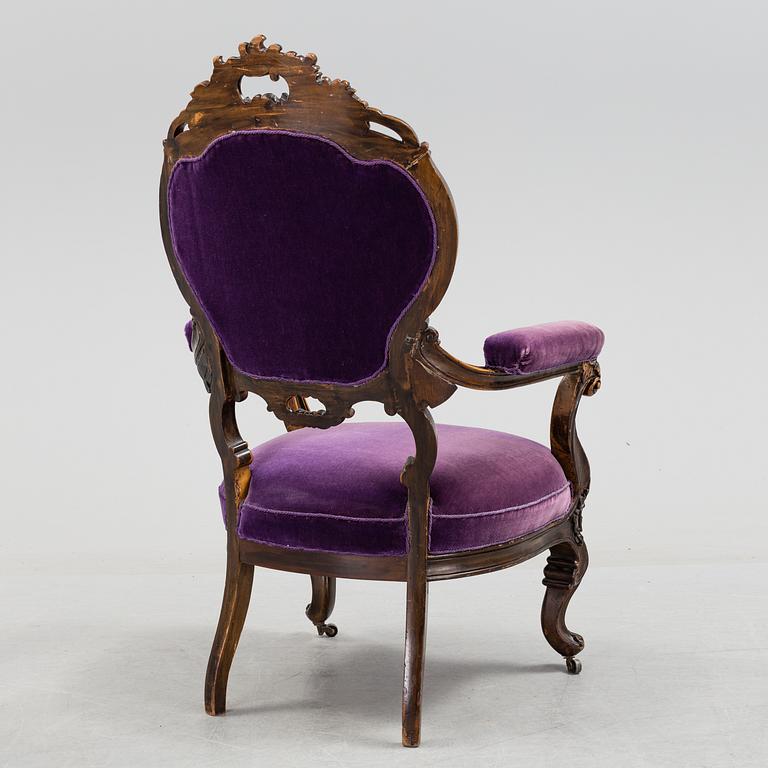 a rococo-style armchair from the second half of the 19th century.