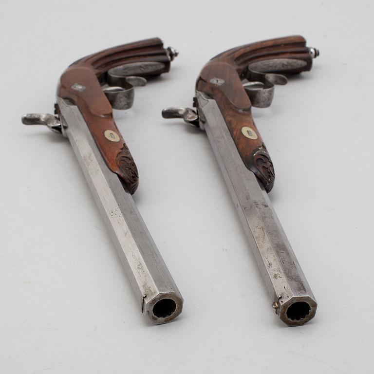 A mid 19th century pair of percussion pistols.