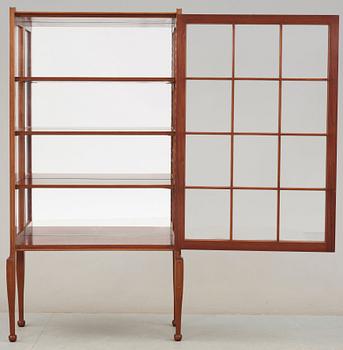 A Josef Frank mahogany showcase cabinet, Svenskt Tenn, model B 2217.