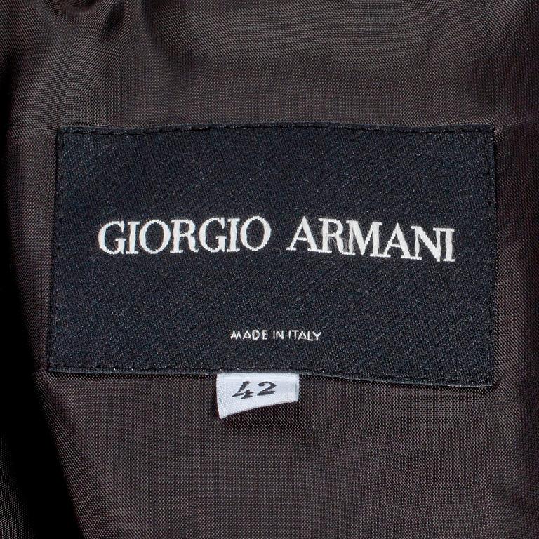GIORGIO ARMANI, a grey corduroy two-piece suit consisting of jacket and pants.