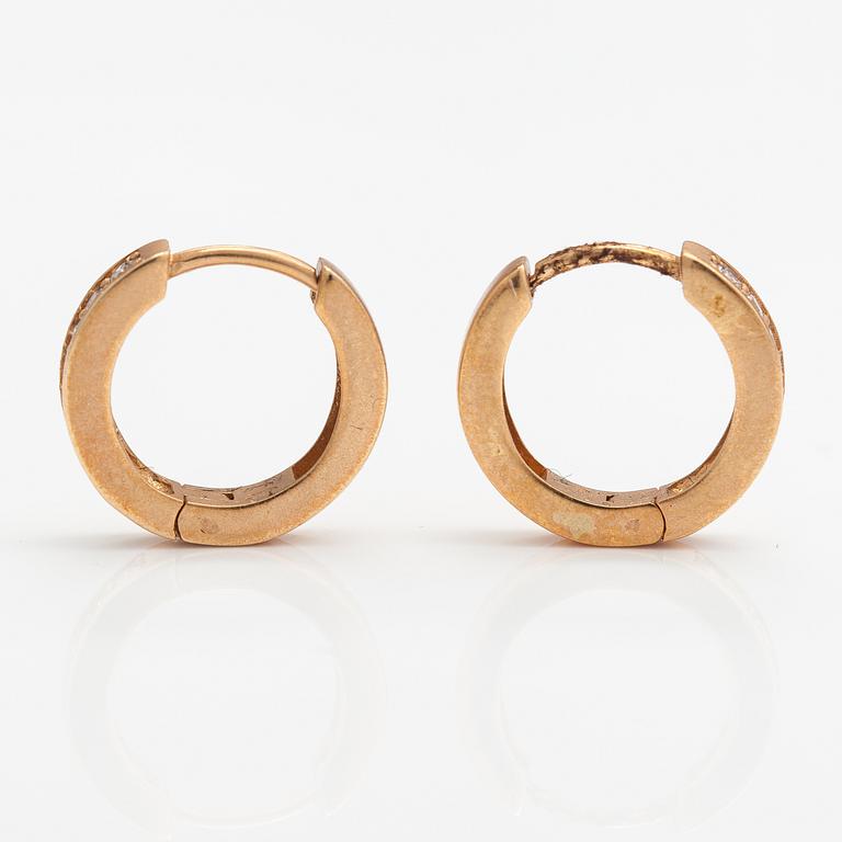 A pair of 14K gold earrings with diamonds ca. 0.26 ct in total. ITD, Espoo.