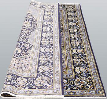 A Kashan rug, ca 206 x 143 cm.